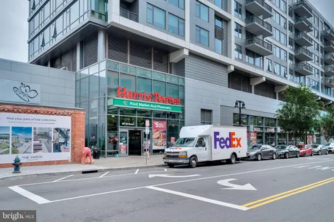 a view of a building with a street