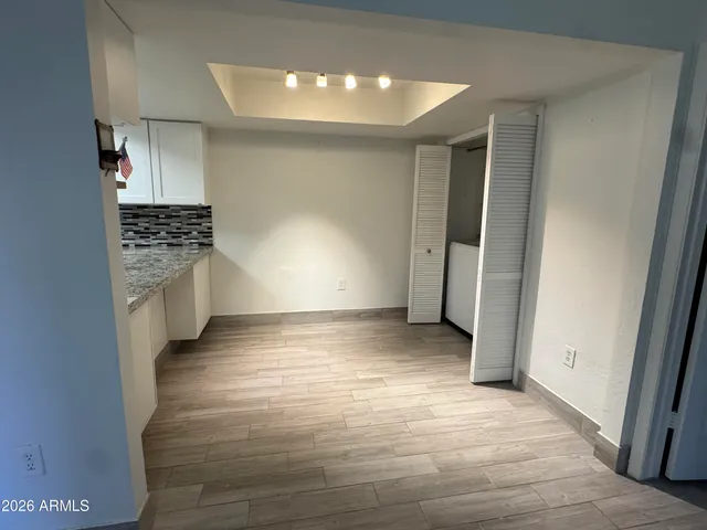a view of a kitchen with a sink and a stove