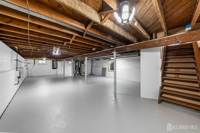 a view of a room with wooden walls