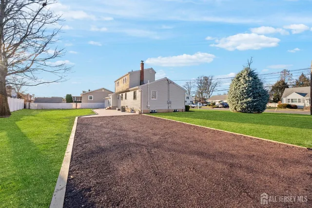 a view of a house with a big yard