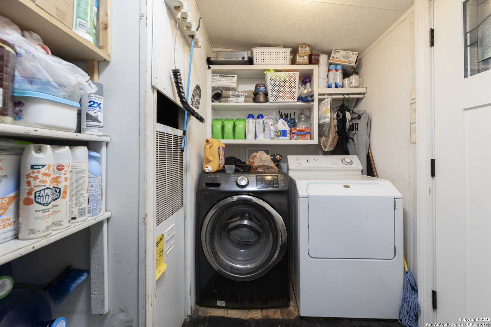 323 County Road 6842 Lytle, TX 78052 - Photo 17 of 25 a utility room with dryer and washer