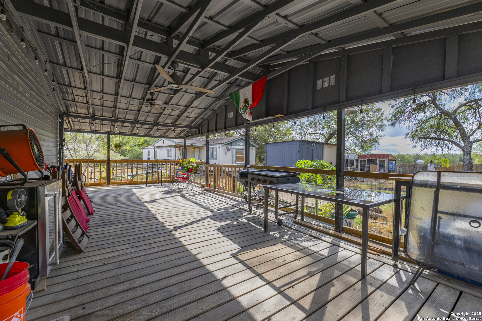 323 County Road 6842 Lytle, TX 78052 - Photo 18 of 25 a view of railway station with sitting area