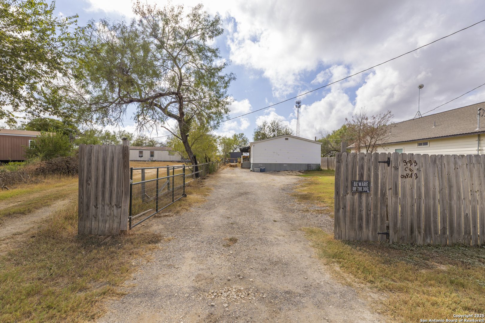 323 County Road 6842 Lytle, TX 78052 - Photo 19 of 25 a view of a entrance gate of a house