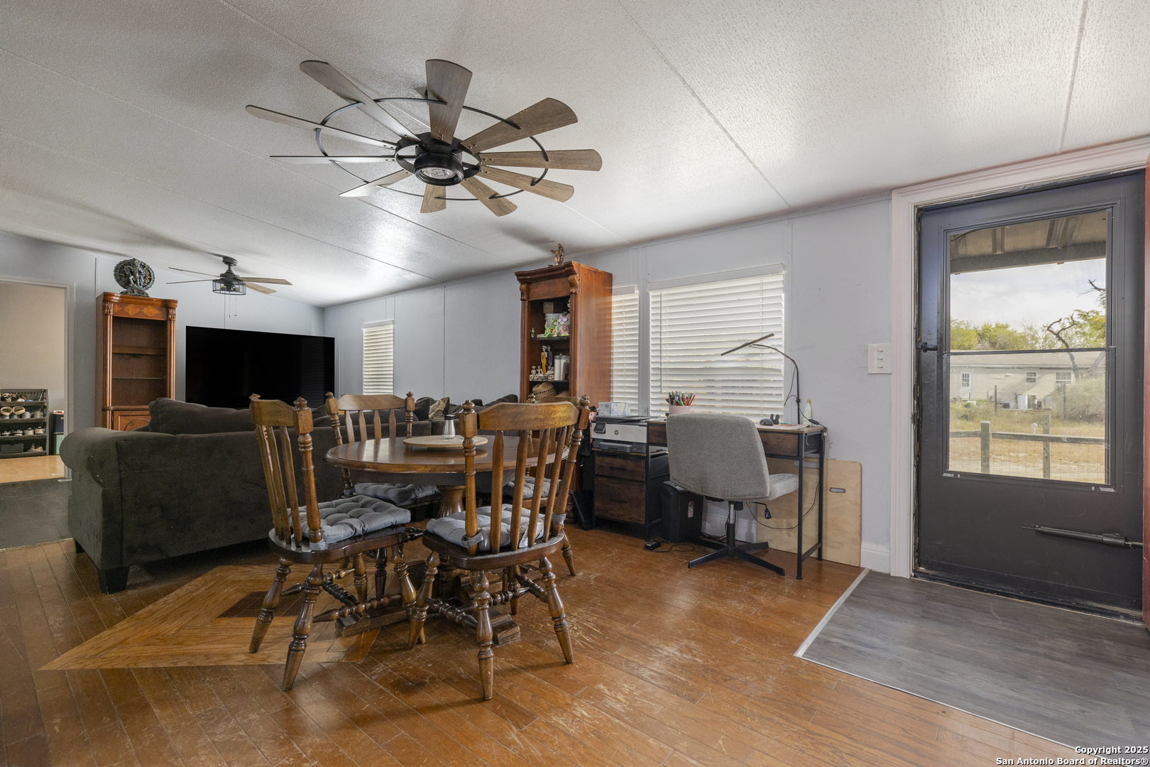 323 County Road 6842 Lytle, TX 78052 - Photo 3 of 25 a view of a livingroom with furniture and a window
