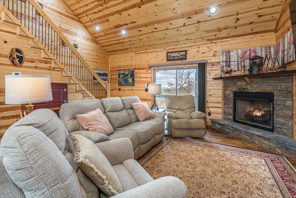 110 Sawtooth Rdg Road Murphy, NC 28906 - Photo 11 of 37 a living room with furniture and a fireplace