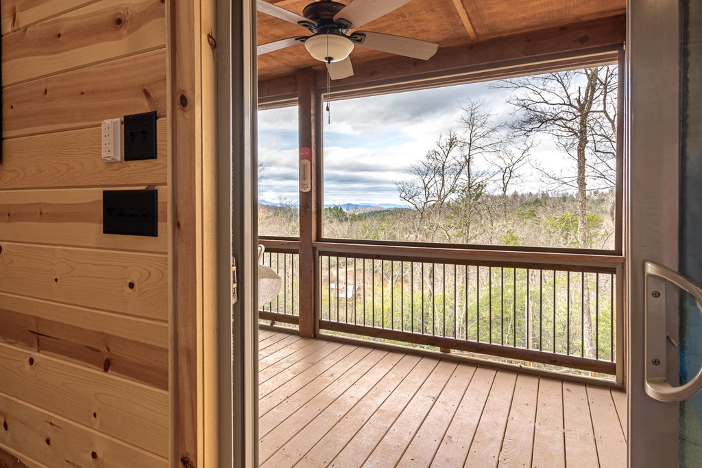 110 Sawtooth Rdg Road Murphy, NC 28906 - Photo 13 of 37 a view of a balcony with wooden floor