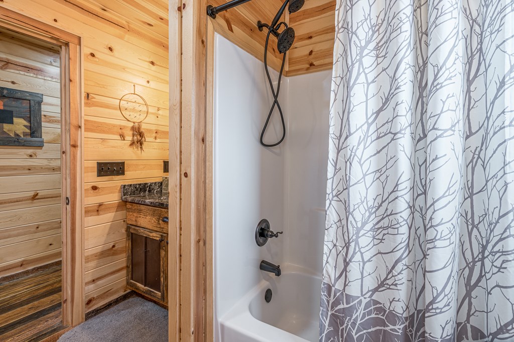 110 Sawtooth Rdg Road Murphy, NC 28906 - Photo 25 of 37 a bathroom with a bathtub and shower