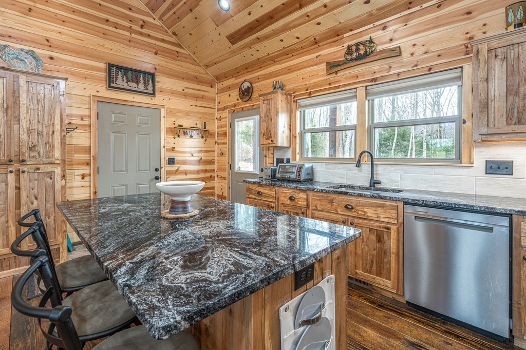 110 Sawtooth Rdg Road Murphy, NC 28906 - Photo 8 of 37 a kitchen with large windows