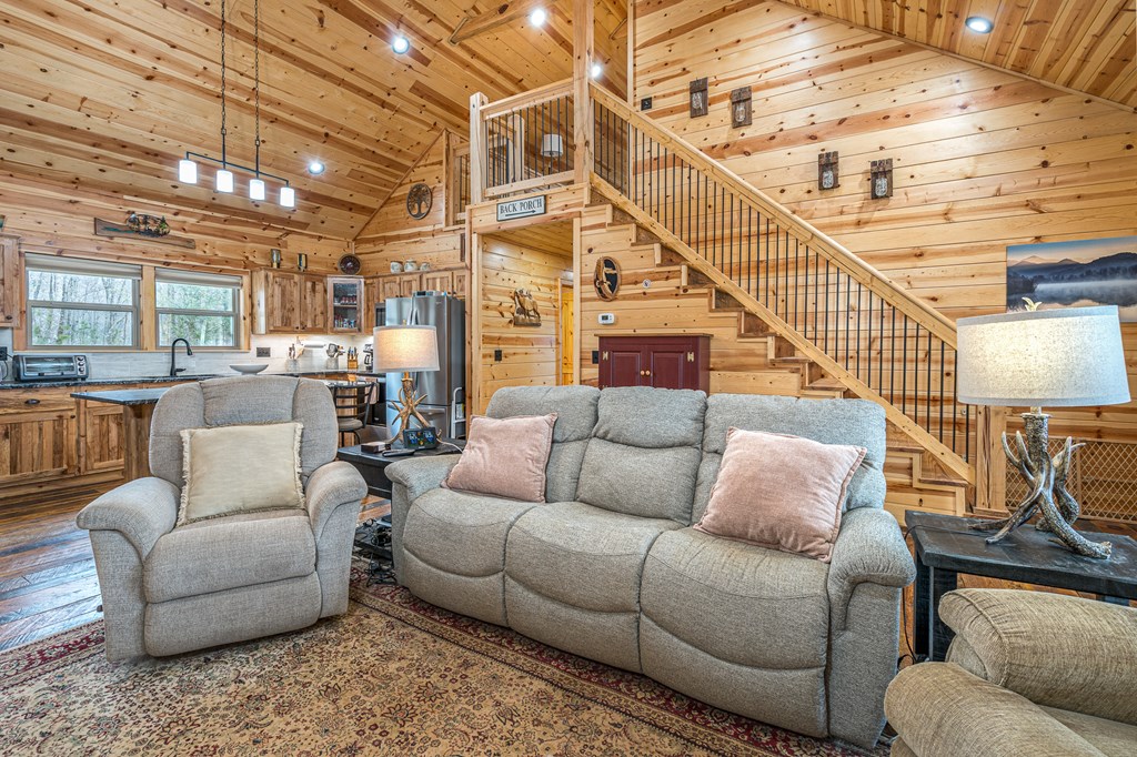 110 Sawtooth Rdg Road Murphy, NC 28906 - Photo 10 of 37 a living room with furniture and a chandelier