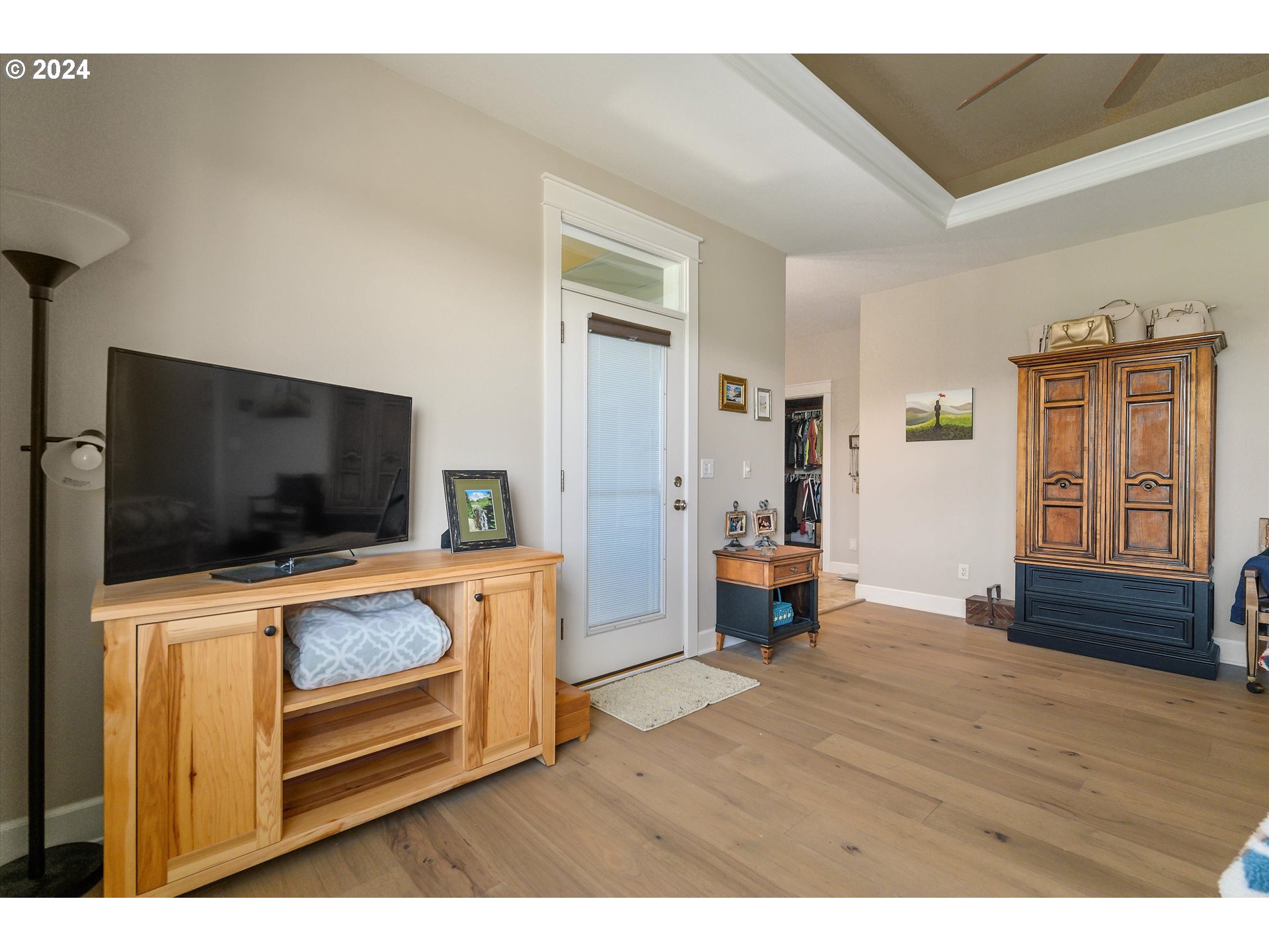 4216 Northwest 289th Street Ridgefield, WA 98642 - Photo 24 of 40 a living room with furniture and a flat screen tv