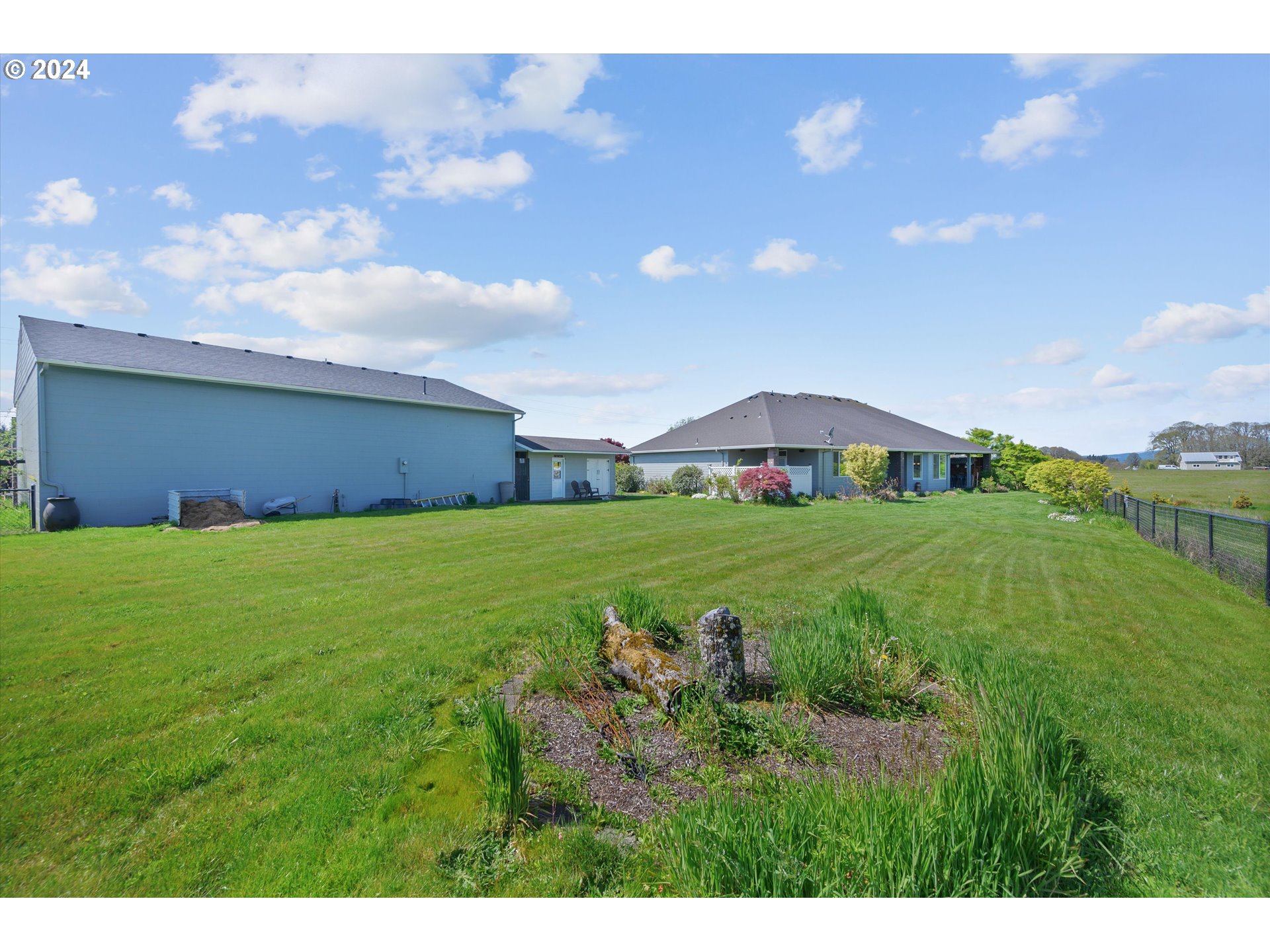 4216 Northwest 289th Street Ridgefield, WA 98642 - Photo 31 of 40 a view of a house with a big yard