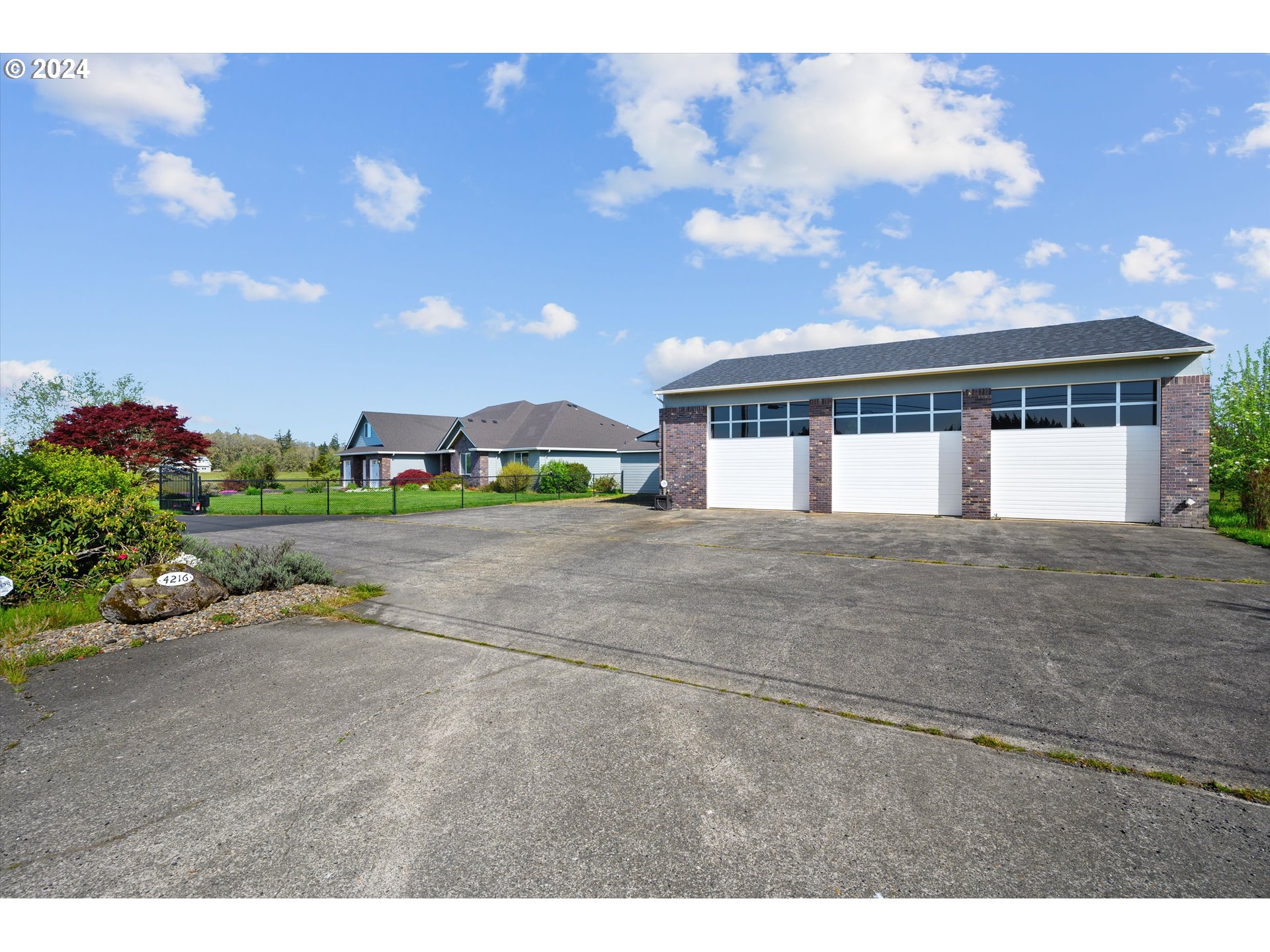 4216 Northwest 289th Street Ridgefield, WA 98642 - Photo 5 of 40 a view of house with outdoor space and street view