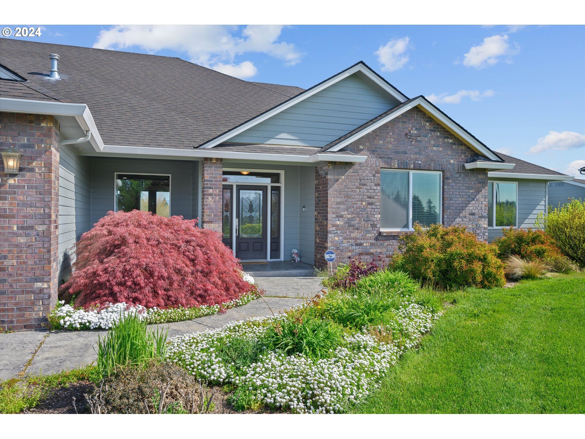 4216 Northwest 289th Street Ridgefield, WA 98642 - Photo 8 of 40 a front view of house with yard and green space