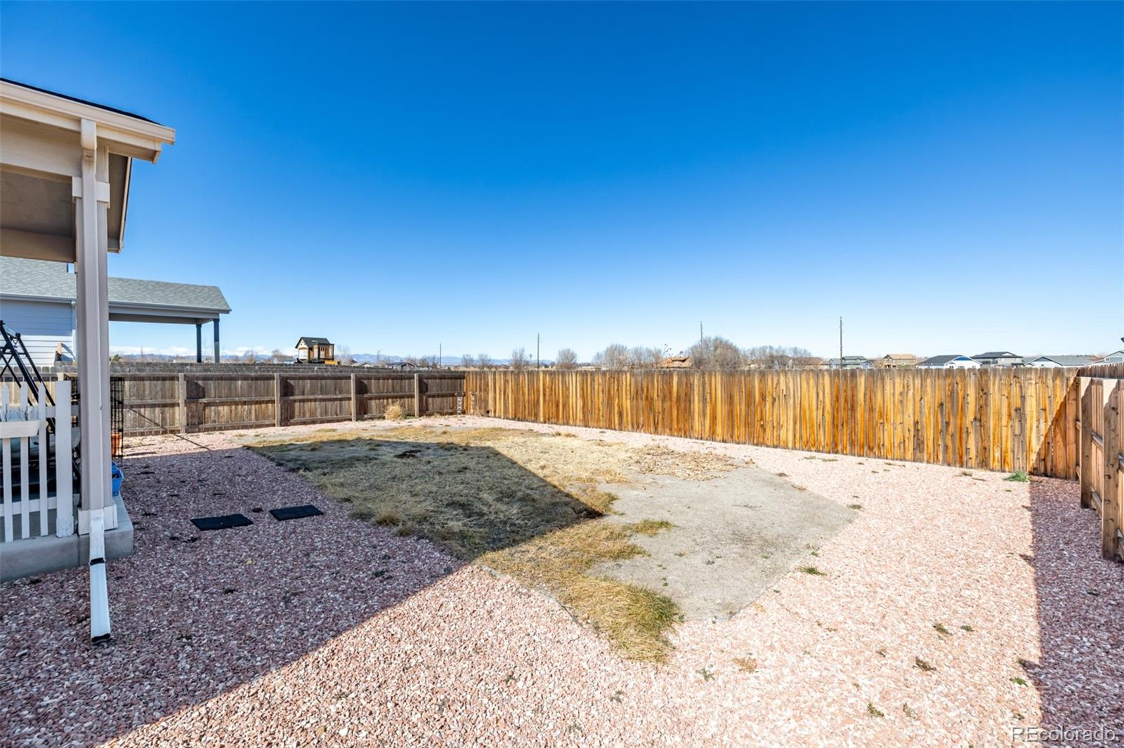 1875 Rancher Drive Milliken, CO 80543 - Photo 32 of 50 a view of swimming pool with a yard