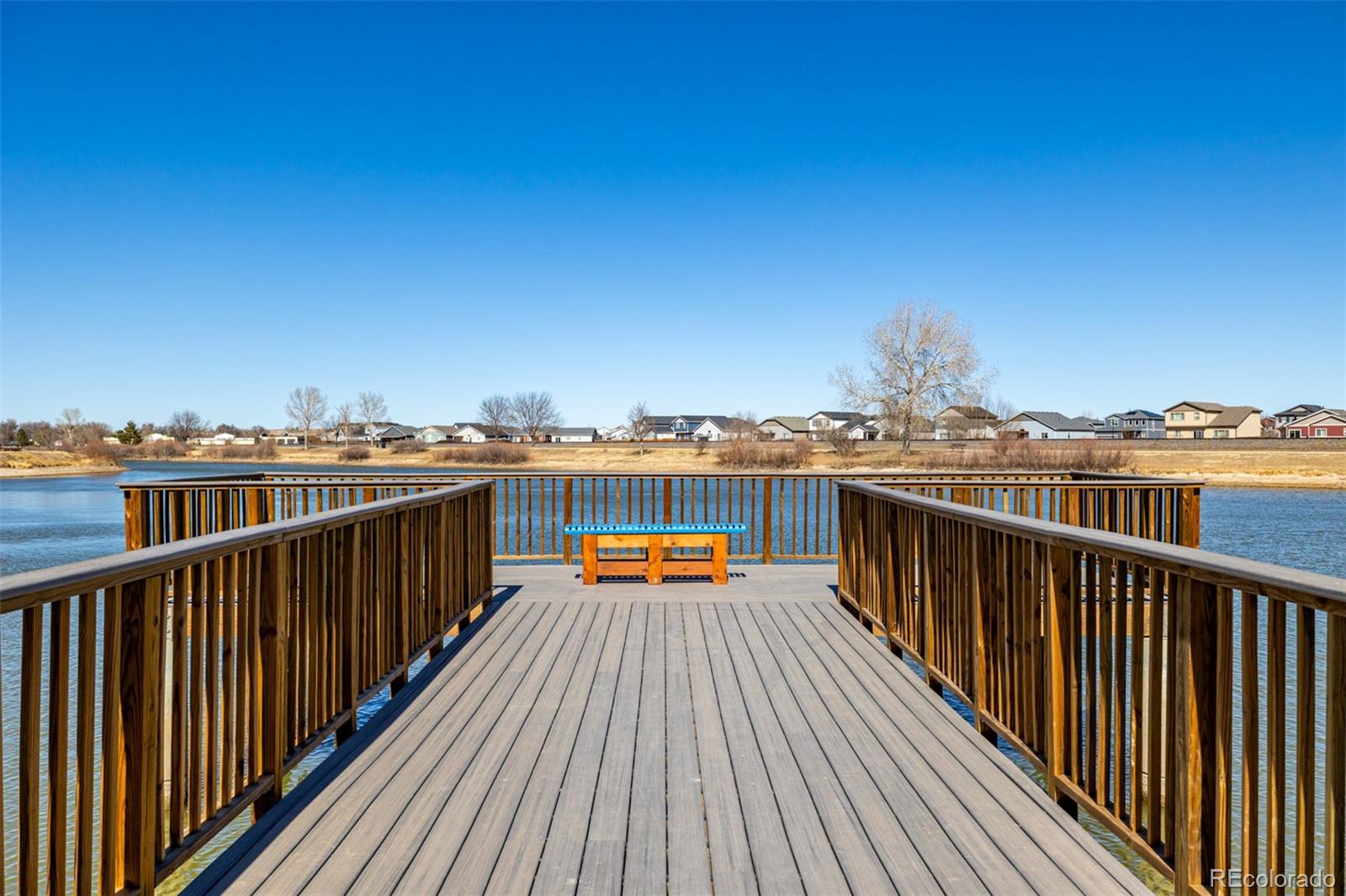 1875 Rancher Drive Milliken, CO 80543 - Photo 39 of 50 a view of roof deck with two chairs and wooden floor