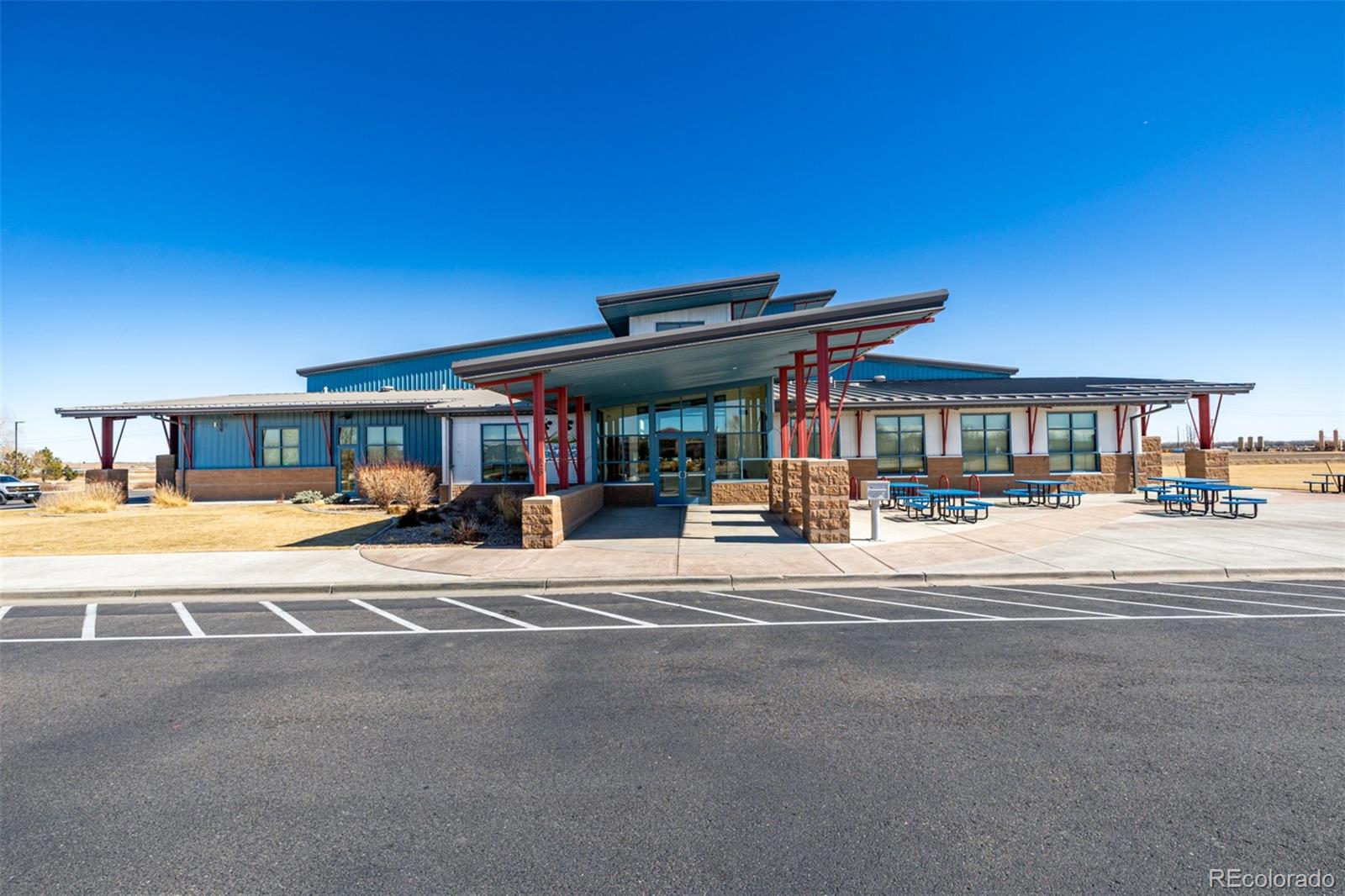 1875 Rancher Drive Milliken, CO 80543 - Photo 44 of 50 a view of a swimming pool in the middle of a yard