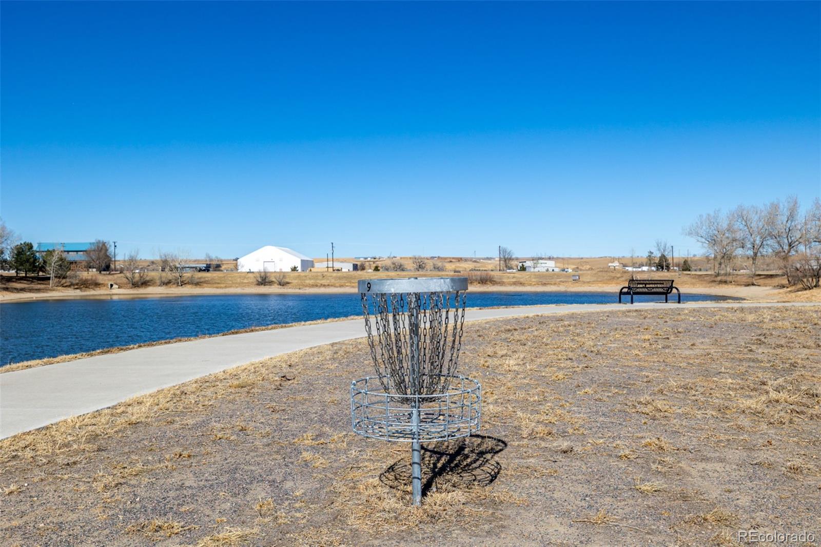 1875 Rancher Drive Milliken, CO 80543 - Photo 47 of 50 a view of a lake with outdoor space