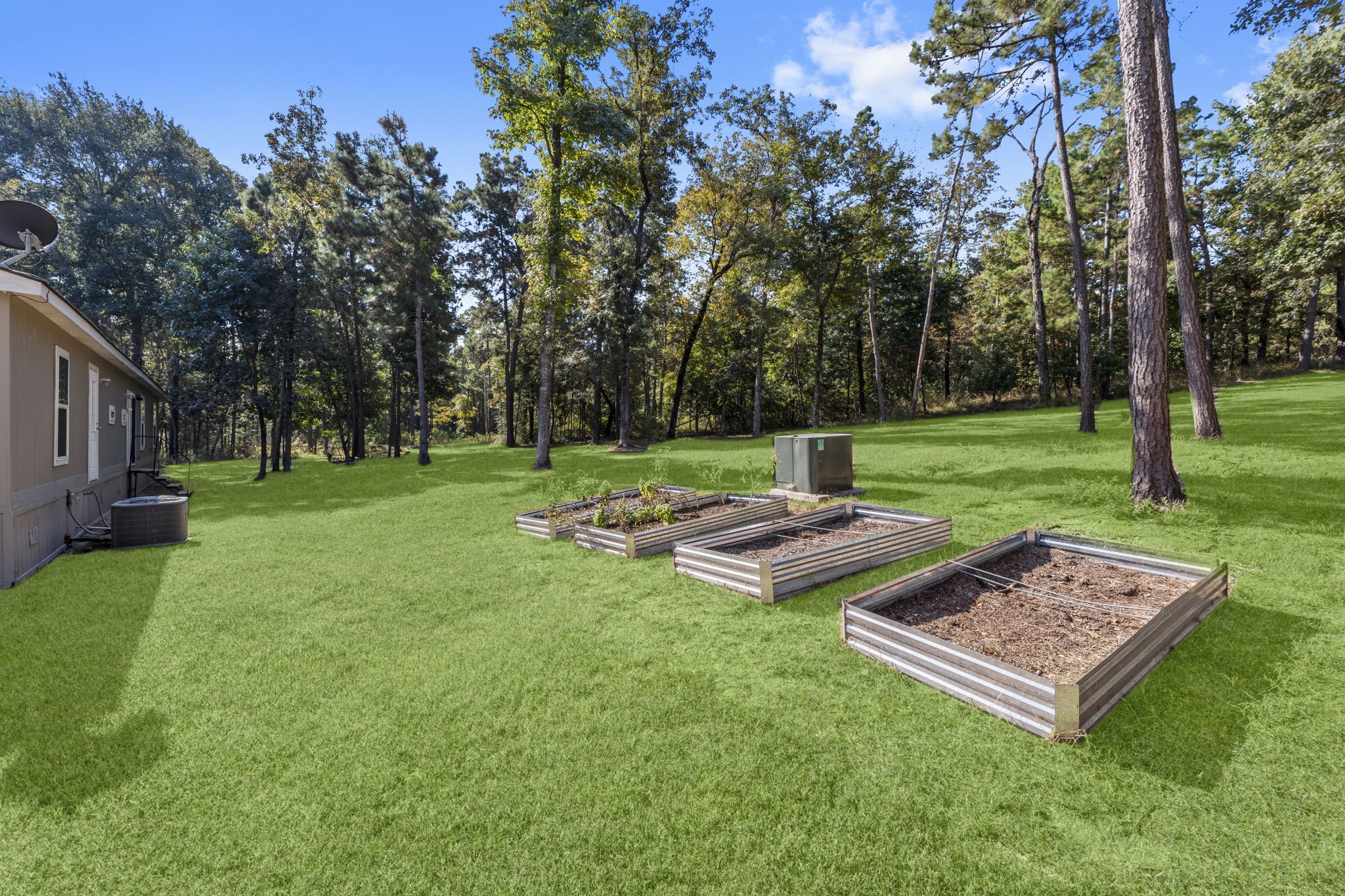 577 Winding River Road South Oakhurst, TX 77359 - Photo 26 of 31 a view of a park with large trees