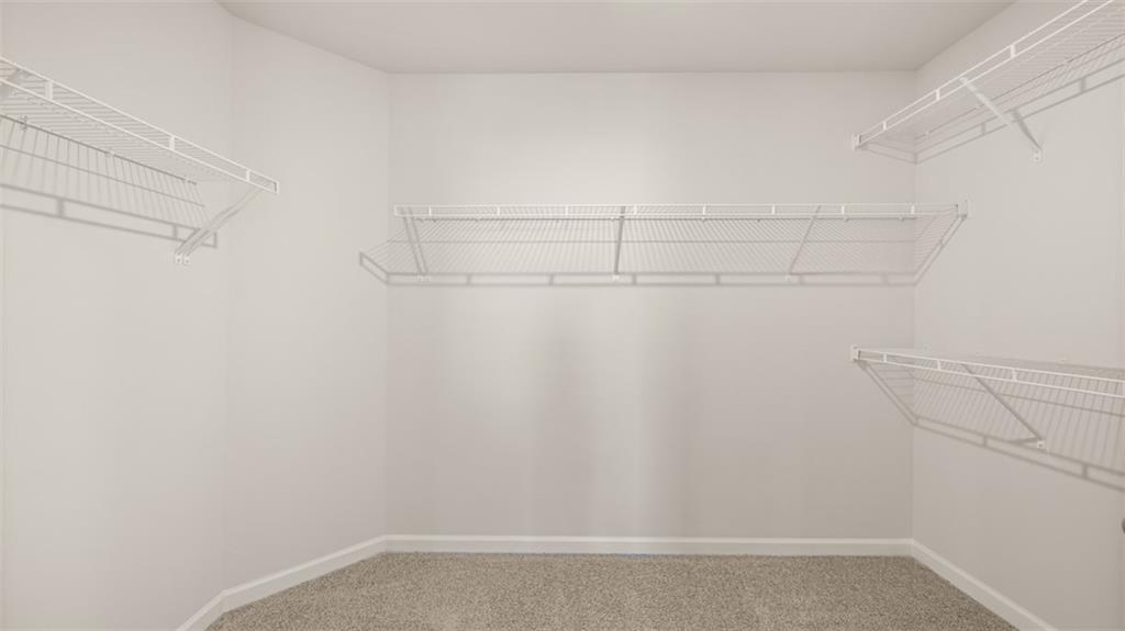 906 Stow Lane Monroe, GA 30655 - Photo 23 of 28 a view of a room with racks on the wall