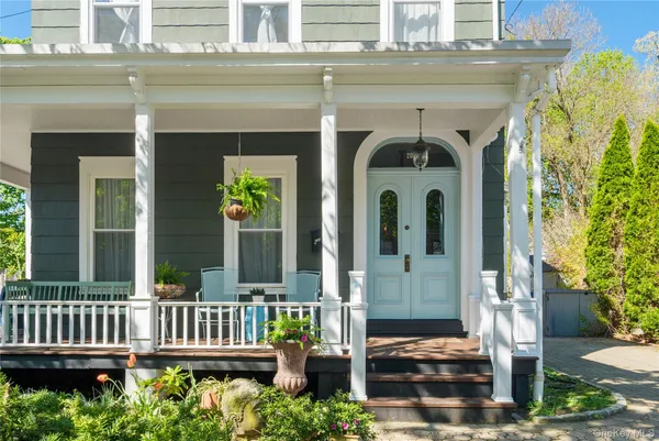 a view of a house with a small porch