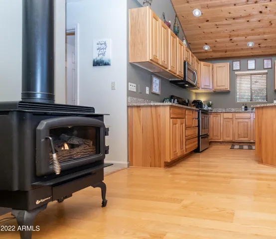 a living room with furniture fireplace and a flat screen tv
