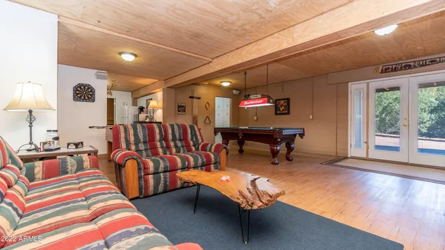 a view of a balcony with wooden floor and outdoor space