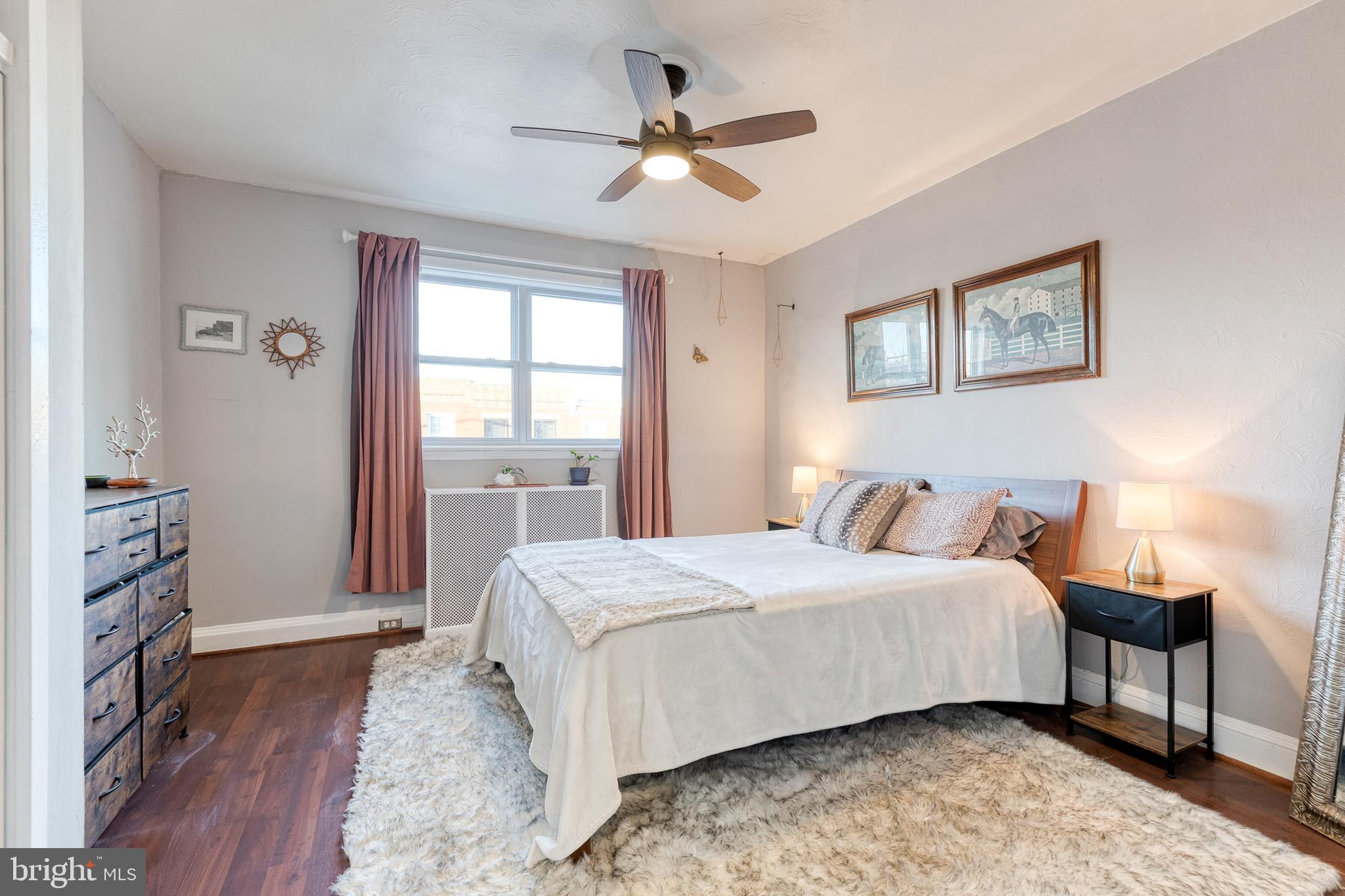 3903 Hudson Street Baltimore, MD 21224 - Photo 17 of 34 a bedroom with a bed and a window