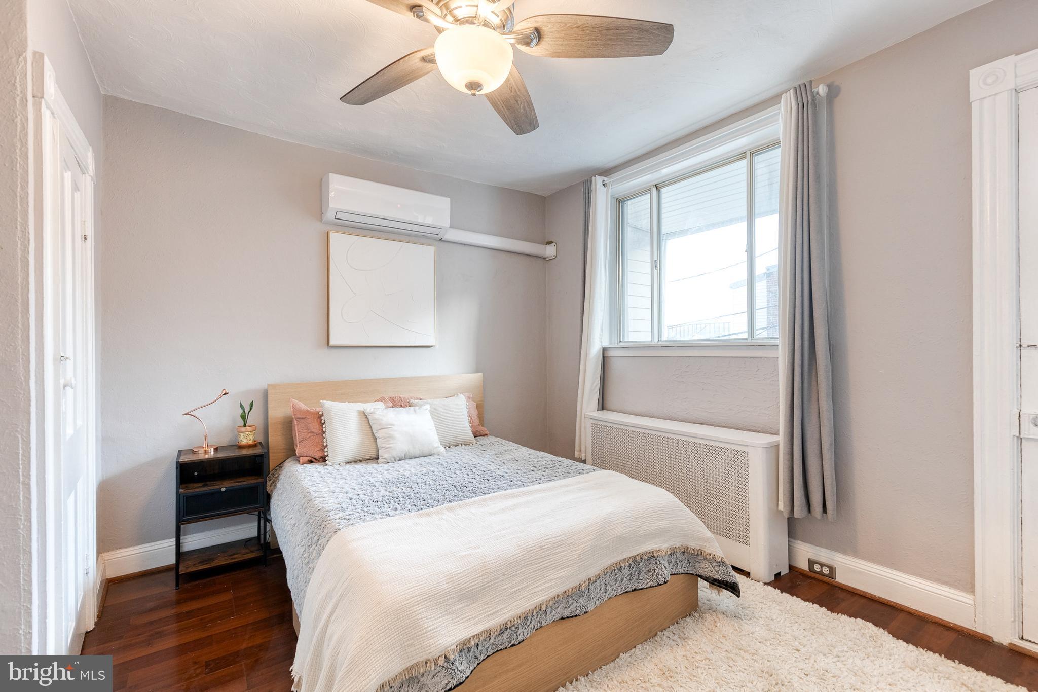 3903 Hudson Street Baltimore, MD 21224 - Photo 20 of 34 a bedroom with a large bed and a window