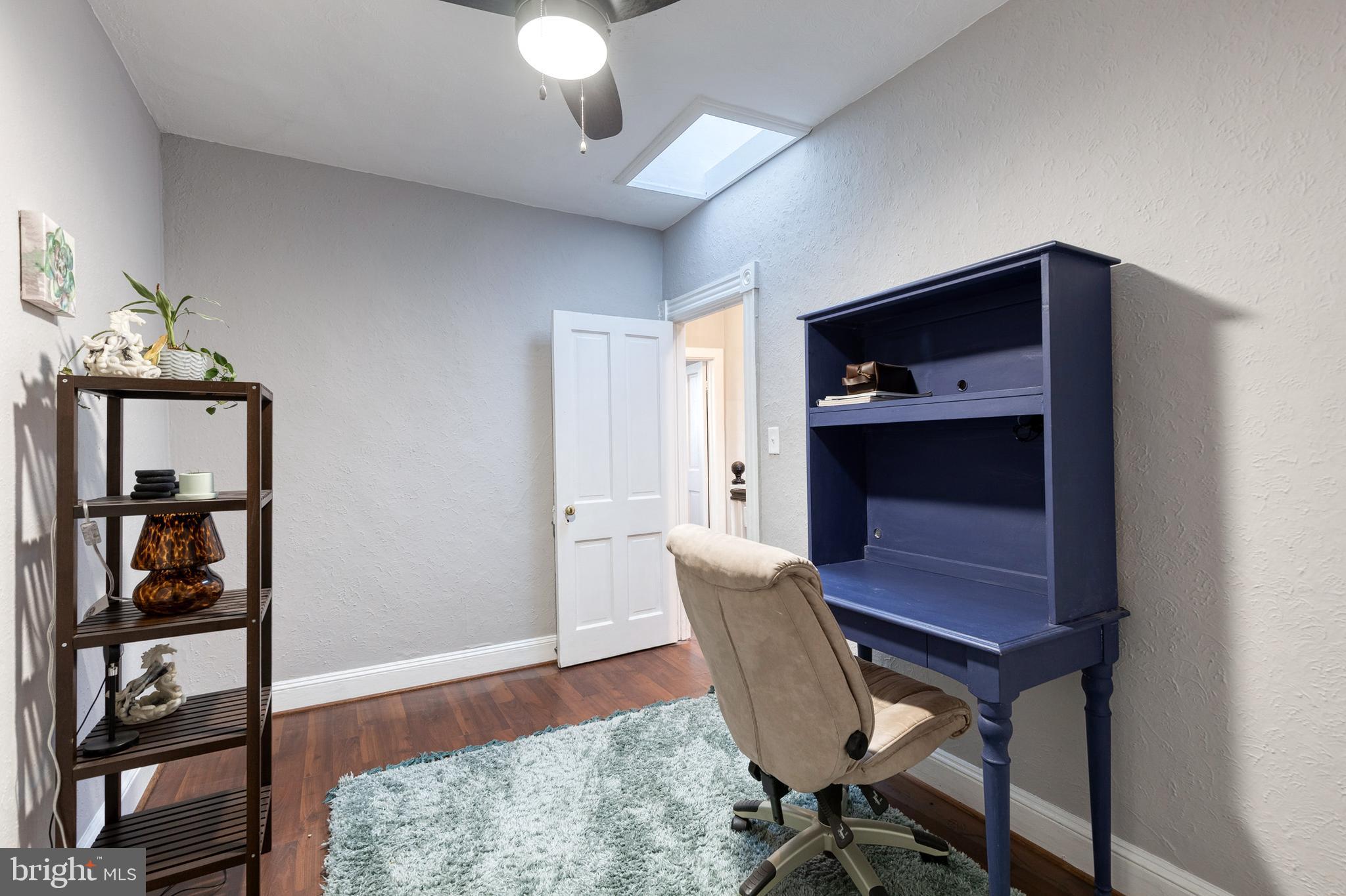 3903 Hudson Street Baltimore, MD 21224 - Photo 23 of 34 a dining room with furniture and wooden floor