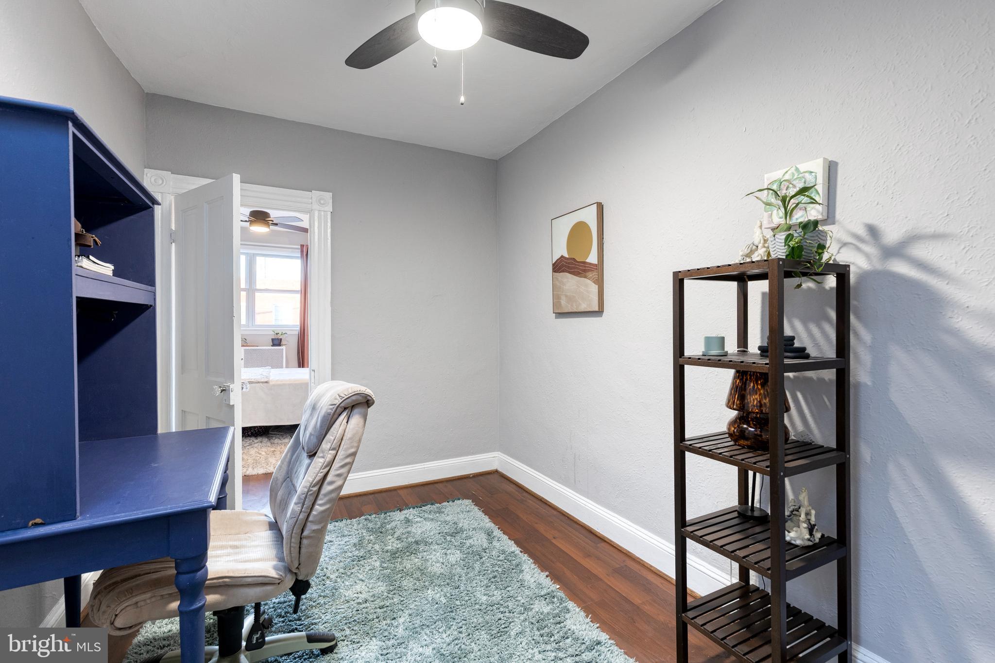 3903 Hudson Street Baltimore, MD 21224 - Photo 24 of 34 a view of a hallway with furniture and workspace