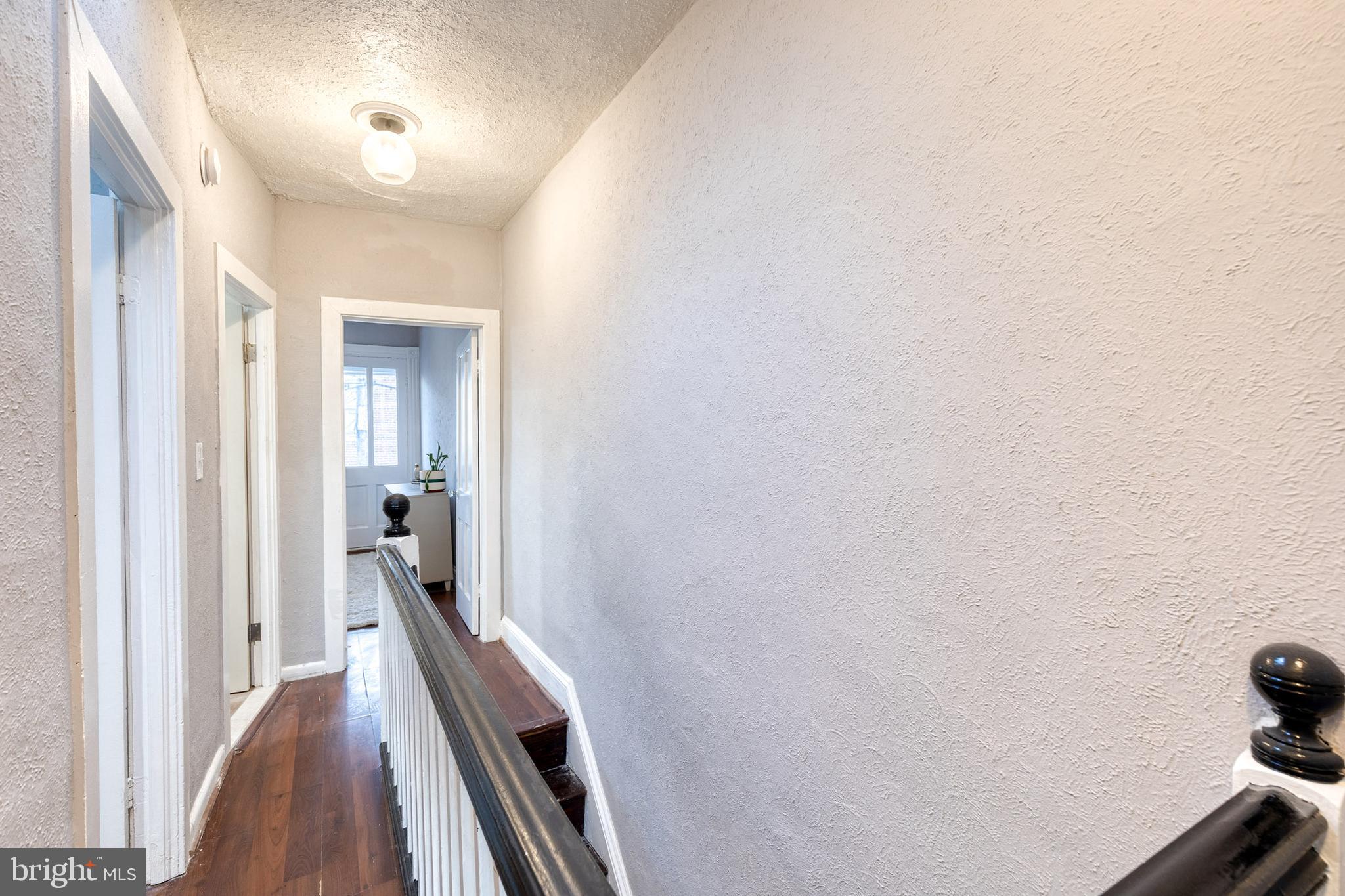 3903 Hudson Street Baltimore, MD 21224 - Photo 26 of 34 a view of a hallway with a dining room