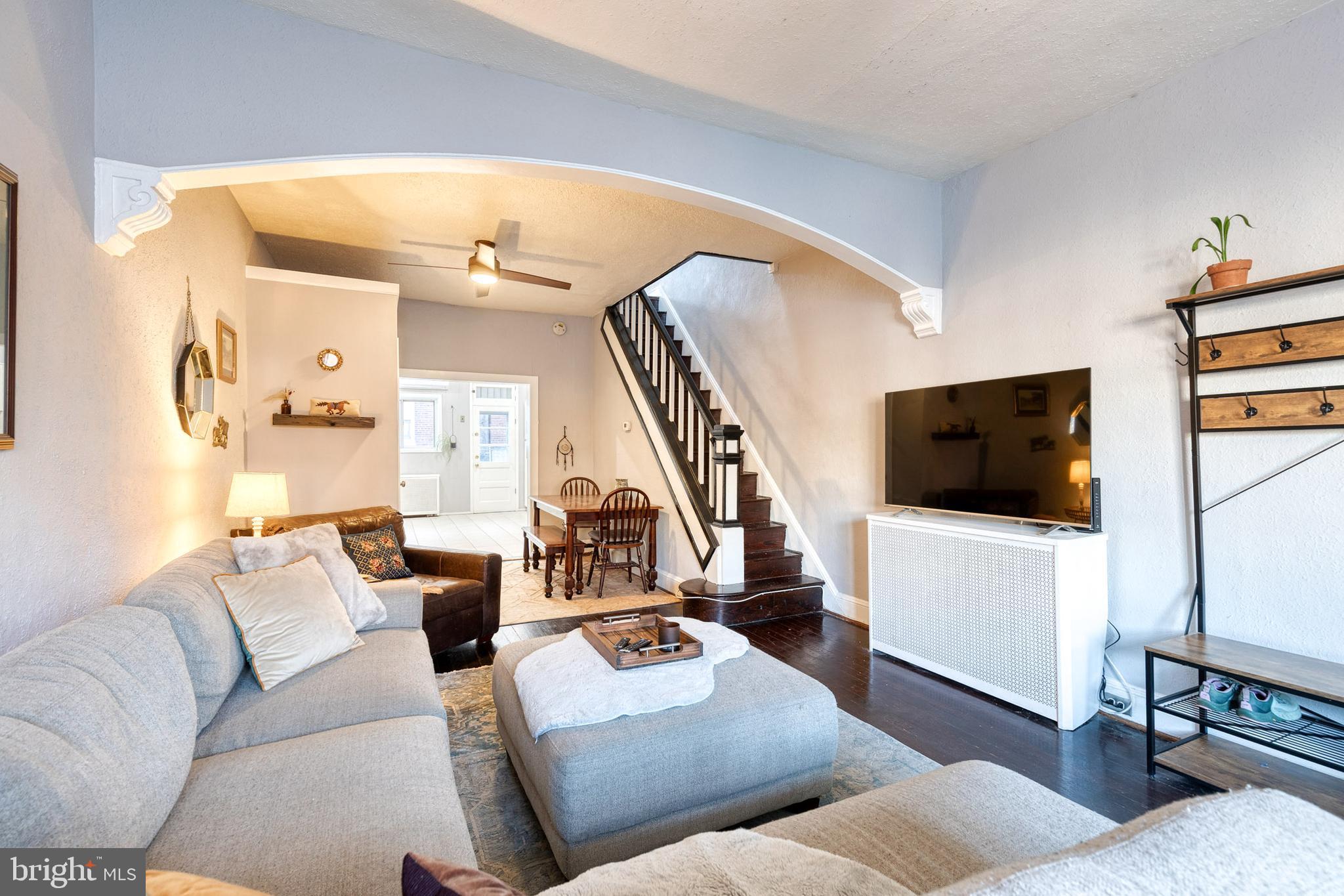 3903 Hudson Street Baltimore, MD 21224 - Photo 4 of 34 a living room with furniture and a flat screen tv