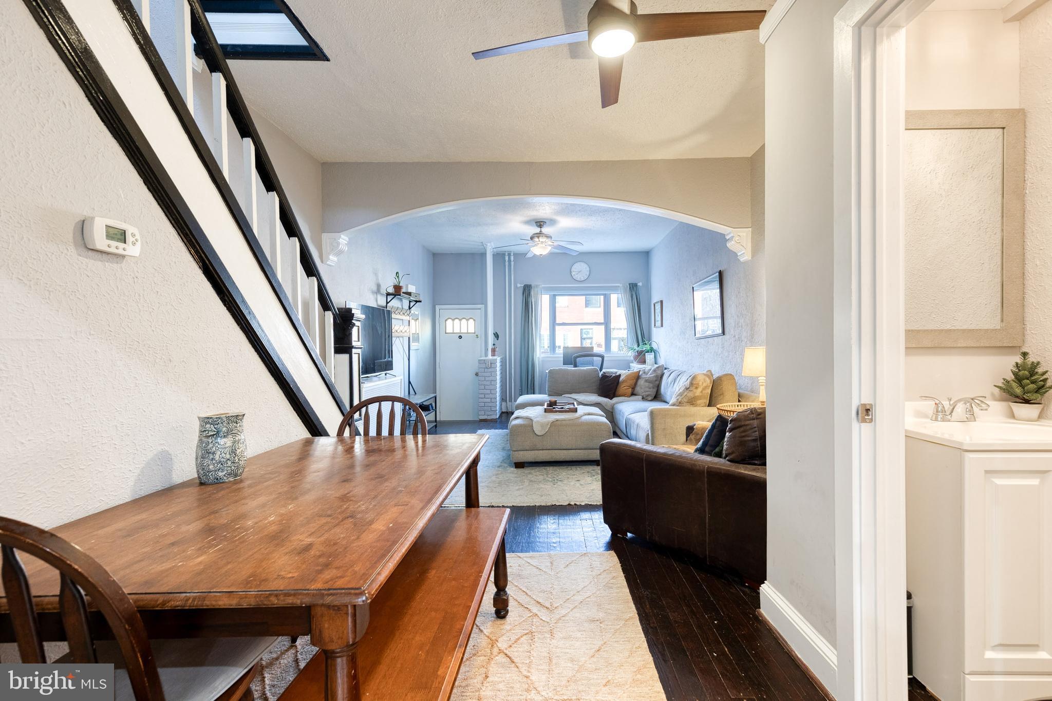 3903 Hudson Street Baltimore, MD 21224 - Photo 8 of 34 a living room with furniture and a chandelier