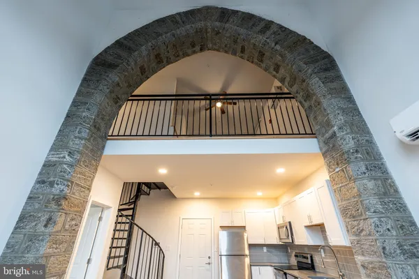 a view of entryway with a front door