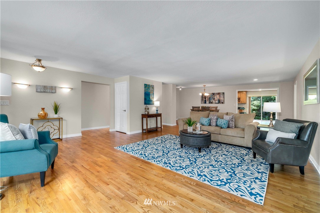 750 South 25th Street Renton, WA 98055 - Photo 8 of 37 a living room with furniture and a wooden floor