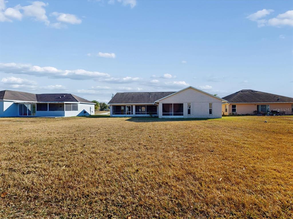 978 Alsace Drive Kissimmee, FL 34759 - Photo 24 of 30 a front view of house with an ocean