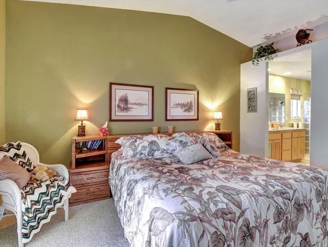 a kitchen with lots of counter space and breakfast area