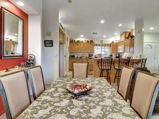 a bedroom with a bed and a dresser in it