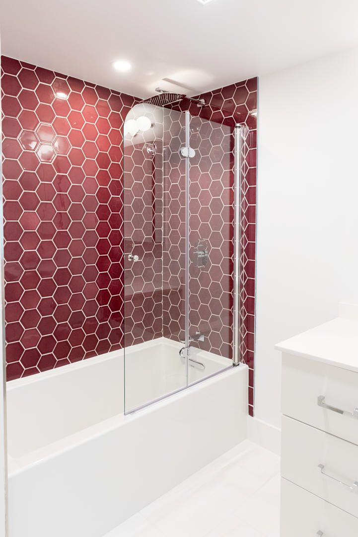 59 Orange Street Nantucket, MA 02554 - Photo 22 of 42 a bathroom with a bathtub and shower
