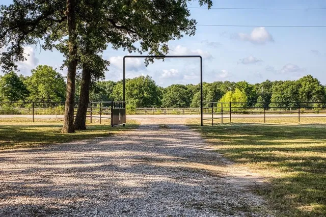 a view of a house and a yard