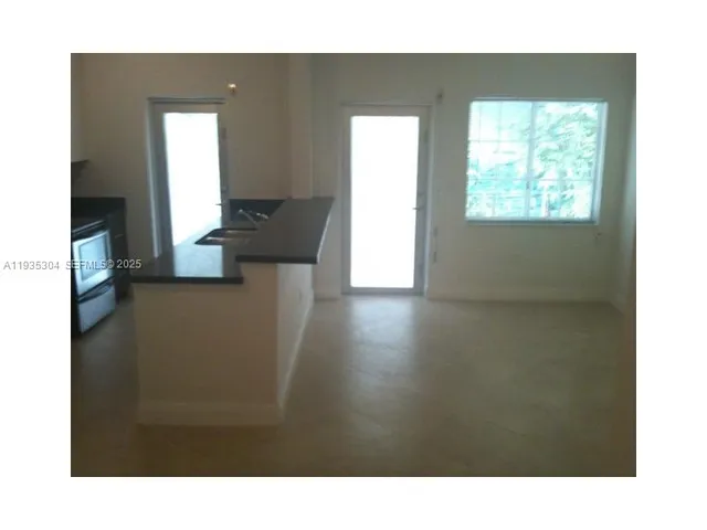 a open hall with a window