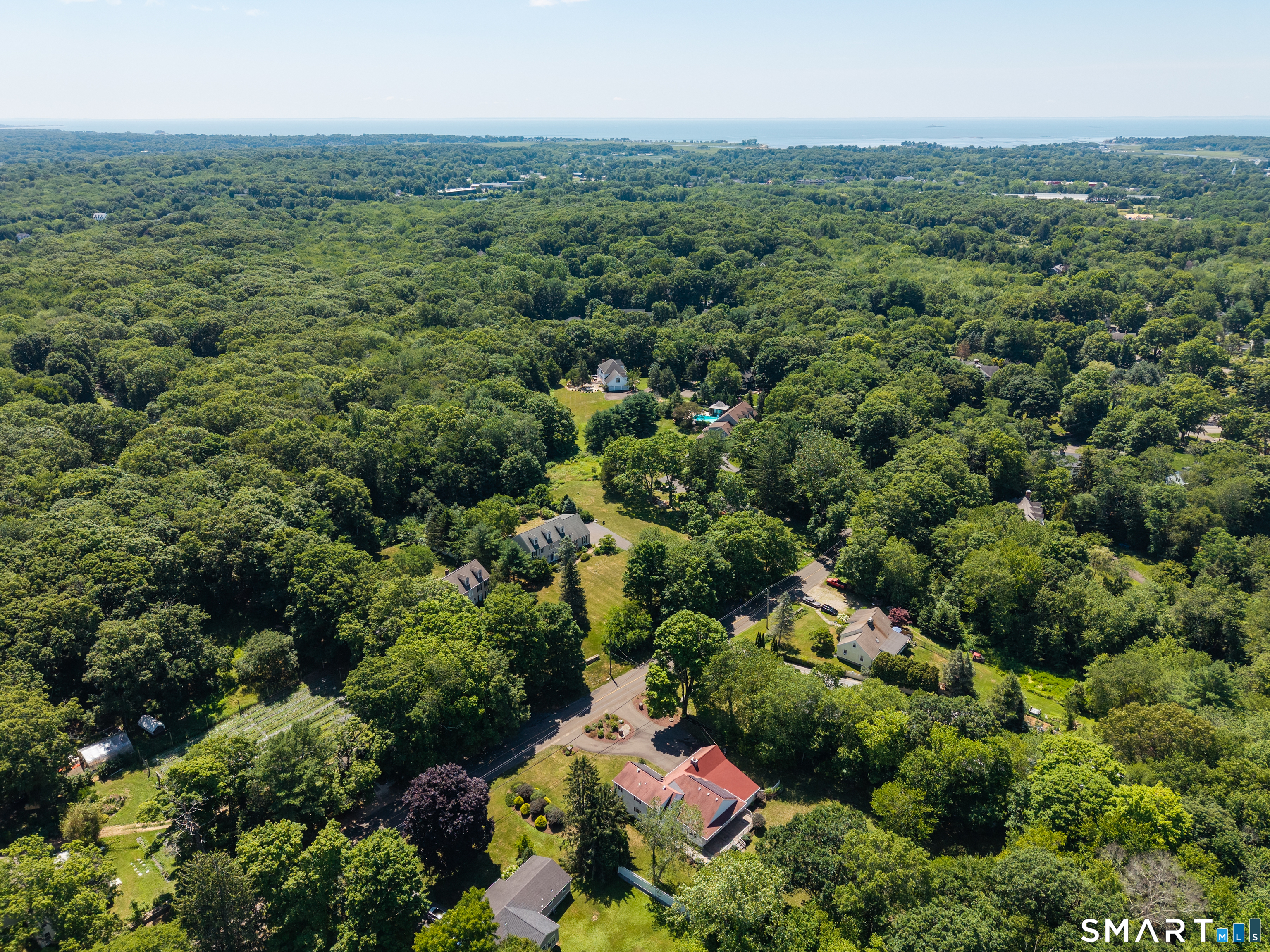 110 Nut Plains Road Guilford, CT 06437 - Photo 2 of 40 With Long Island Sound shimmering on the horizon, this location puts everything within reach: I-95, the Post Road, the Guilford Green, the train station, and the beaches.