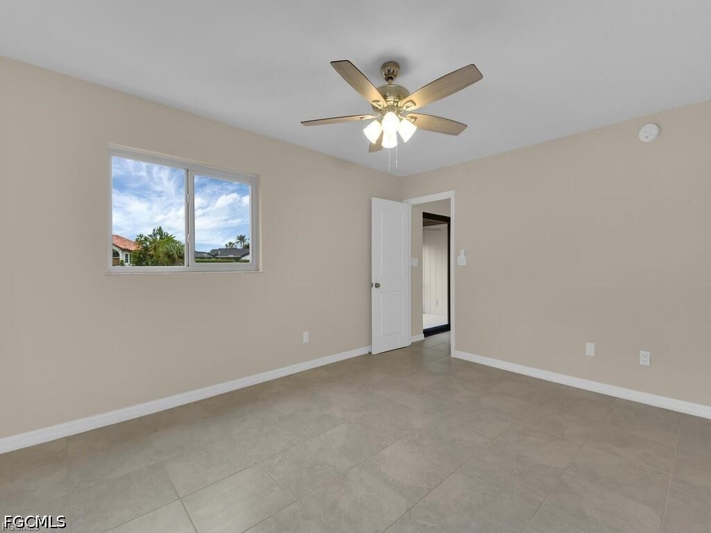 16560 Partridge Place Road, Unit 101 Fort Myers, FL 33908 - Photo 12 of 27 a view of an empty room with a window