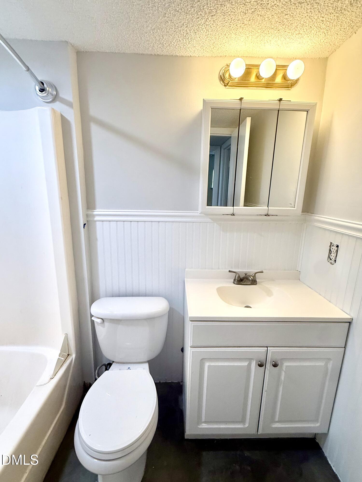 546 Pine Ridge Place Raleigh, NC 27609 - Photo 15 of 28 a bathroom with a sink a toilet and shower