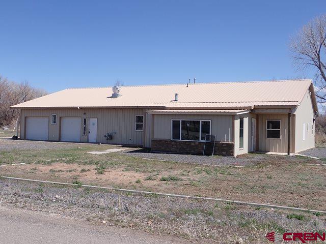 10944 Mesa View Loop Eckert, CO 81418 - Photo 1 of 10 a view of a house with a outdoor space