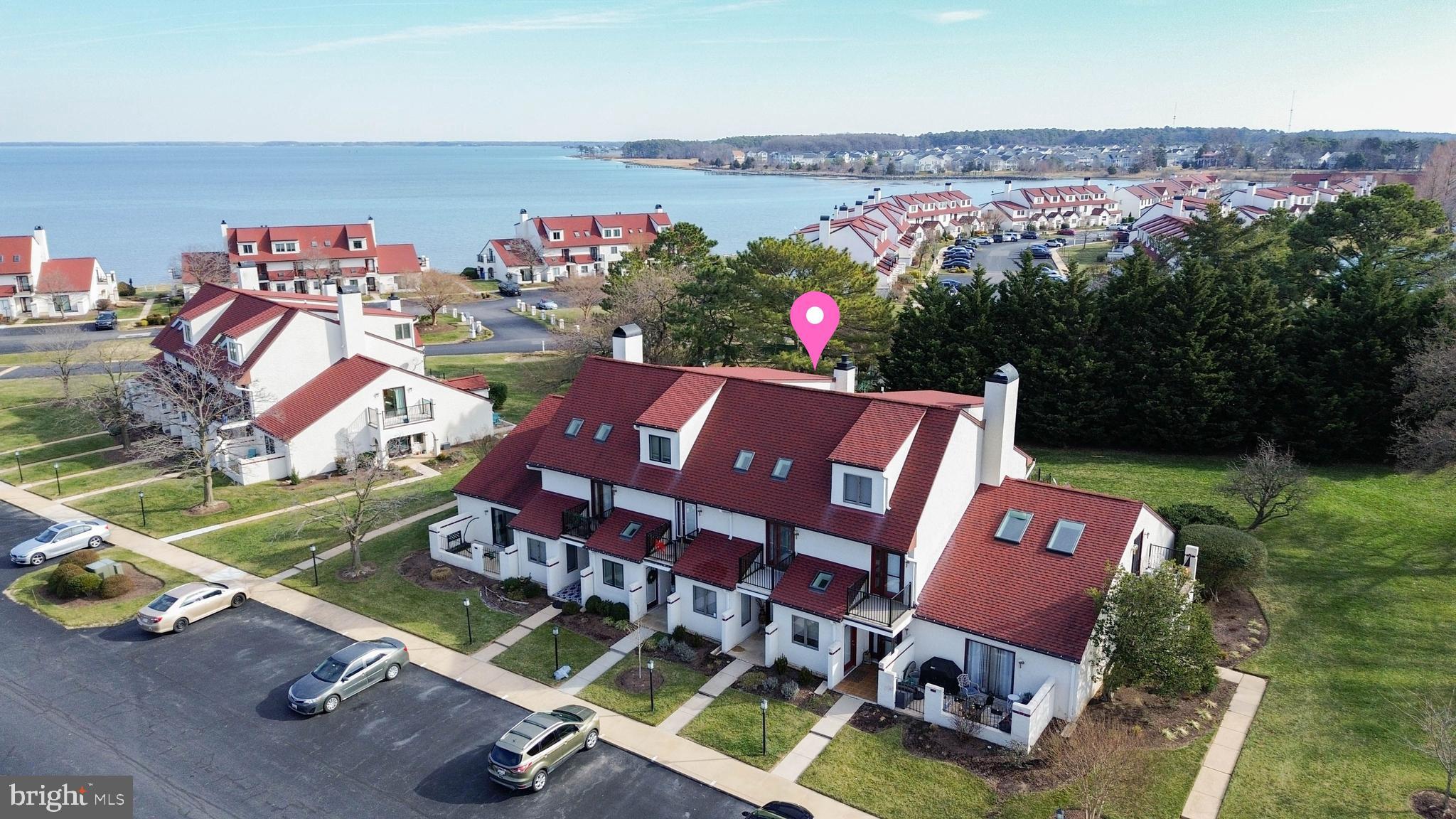 an aerial view of a chairs and table on the terrace