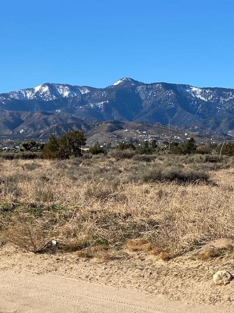 0 Centola Road Phelan, CA 92329 - Photo 1 of 1 a view of a lake with mountains in the background
