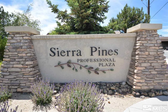 a sign that is on the side of the building