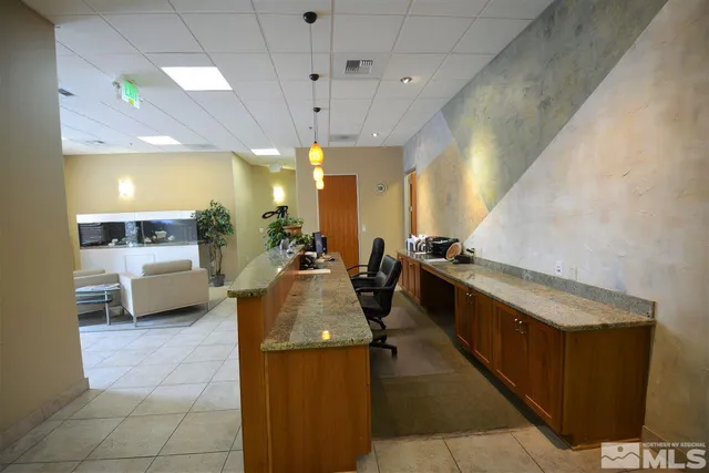 a bathroom with a sink a vanity and mirror