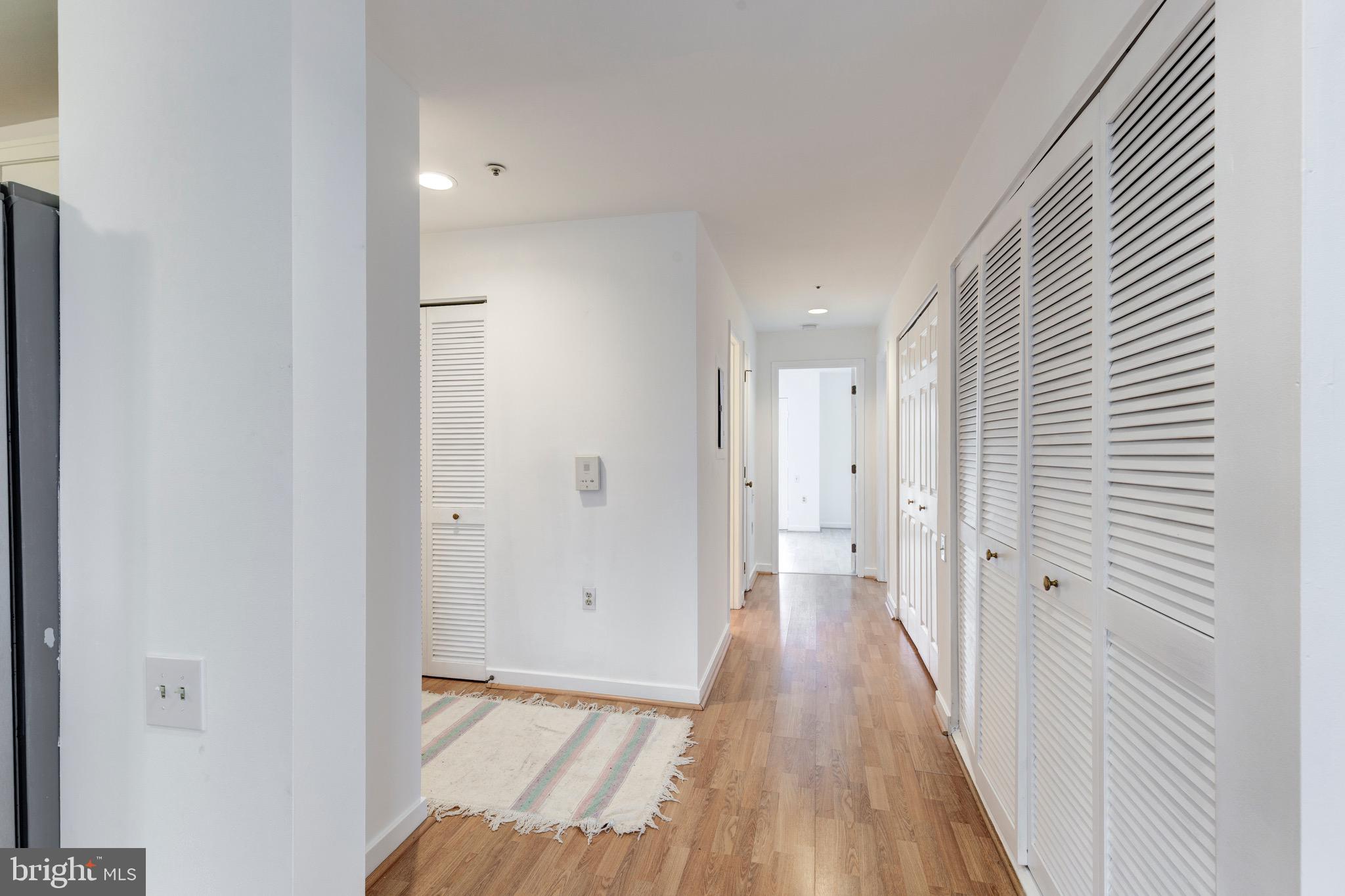 385 Pleasanton Road, Unit B22 Westminster, MD 21157 - Photo 20 of 35 a view of a room with wooden floor and a bathroom